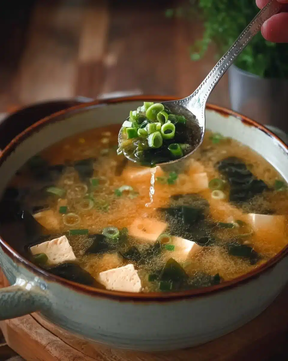 Easy Miso Soup (Gluten Free) 1 Bowl of easy gluten-free miso soup with green onions and tofu