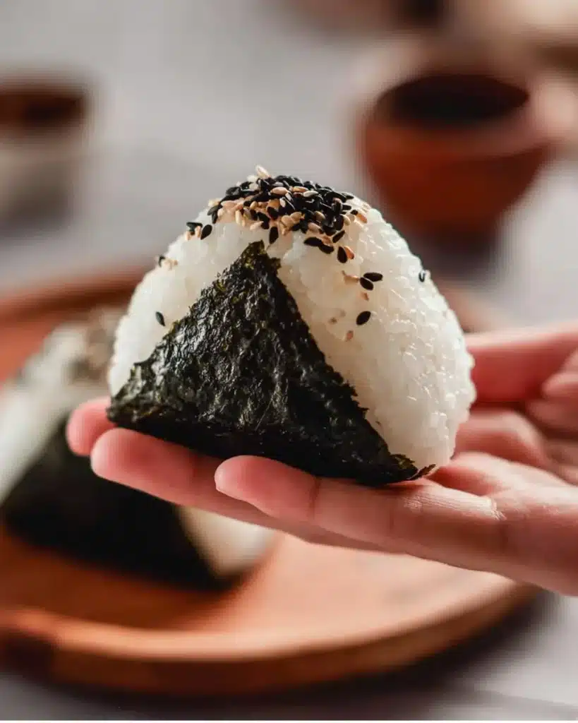 Plate of delicious homemade tuna rice balls garnished and ready to serve