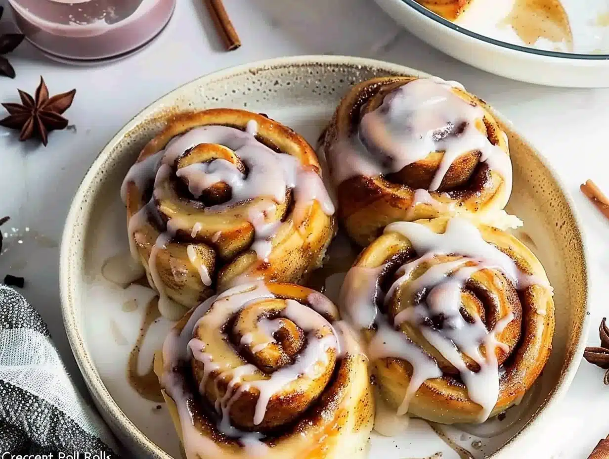 Fluffy Crescent Roll Cinnamon Rolls drizzled with icing.