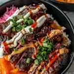 Korean BBQ Steak Rice Bowl with grilled beef and vegetables