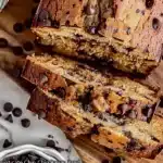 Slice of super moist chocolate chip banana bread on a plate